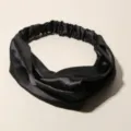 Elegant black satin wide twist headband with elastic back for comfortable styling - Black