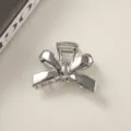 Elegant silver metallic bow-shaped hair claw clip for women's hairstyle - Bulk Packaging / Bowknot Silver