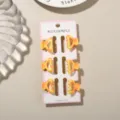 Set of 6 mini 2.5cm hair claw clips with orange marble pattern on display card - 6 Pieces/Pack / Glossy Yellow