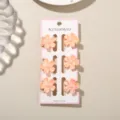 Set van 6 mini haarclips met perzikbloesem van 2,5 cm in vrolijke snoepkleuren - Parelmoer Koraalroze