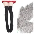 Calze alte nere sopra il ginocchio con motivo jacquard a foglia, eleganti e comode. - Nero con Foglie Bianche