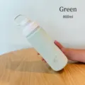 Isolierte 800ml hellgrüne Edelstahl-Sportwasserflasche mit Tragegriff am Deckel - 800ML / Grün