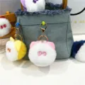 Detailed macro view of cute fluffy cat head keychain charms hanging on a denim bag strap - Cat Head Style (PJMQ81022) / Single Piece / Pink