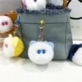 Close-up of cute plush cat head keychains hanging on a denim bag as accessories - Cat Head Style (PJMQ81022) / Single Piece / Sky Blue