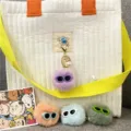 Cute fuzzy monster keychain charms with sunglasses and pearls on a bag. - Single OPP Bag Packaging / Purple