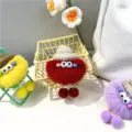 Colorful fuzzy pom-pom keychains with eyes and knit hats in SKU set view - Red