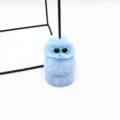 Detail shot of a cute light blue plush caterpillar keychain with sunglasses accessory. - Single OPP Bag Packaging / Sky Blue