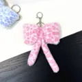 Stylish pink leopard print plush bow keychain pendant for women's bags and keys - Pink