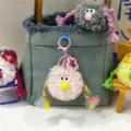 Handmade ugly-cute plush monster keychain with colorful braids and star clip for bags - 1 Piece / Pink