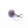 Soft purple faux fur pom-pom keychain featuring a silver-tone metal ring and lobster clasp - Single OPP Bag Packaging / Gray
