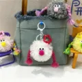 Cute white plush ball keychain with pink braids and googly eyes for backpacks and bags - 1 Piece / White