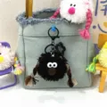 Quirky black plush monster keychain with brown braids for bags and backpacks charm - 1 Piece / Black