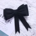 Grote zwarte strik taarttopper voor verjaardagen in elegante Scandinavische minimalistische stijl - Zwart