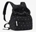 Détail de sac à dos pour animal à pois noirs avec cordon en mesh respirant et poche zippée. - Sac pour animaux à pois noirs