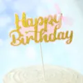 Elegant gold glitter Happy Birthday cake topper featuring a pink mesh bow and pearl detail - Happy Birthday With Pearl And Tulle Bow