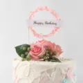 Detailed view of forest style pink leaf wreath cake topper with Happy Birthday ribbon - Pink Leaf Happy Birthday