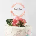 Detailed view of Sweet Love leaf wreath cake topper with artificial pink roses - Pink Leaf Sweet Love
