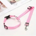 Pink pet car safety seat belt leash with durable nylon strap and metal hook for safe travel. - Pink