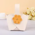 Elegant handheld beige leather wedding candy gift bag with orange flower ornament - White with Yellow Flower / White