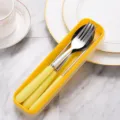 Portable yellow stainless steel cutlery set includes spoon fork and chopsticks in a box - Three-Piece Set / Yellow