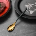 Modern stainless steel dinner spoon with polished gold finish and matte black handle - Tea Spoon / Dark Green