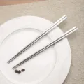 Premium Korean style 304 stainless steel flat chopsticks on white floral ceramic plate - Chopsticks / Silver