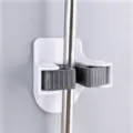 Supporto a parete per scopa e mocio con pinza in silicone antiscivolo per organizzare il bagno. - Adesivo Rimovibile / Bianco