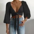 Sexy long sleeve crop top with deep V neck and front tie design, ideal detail view. - L / Tops / Black