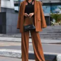 Stylish brown women pantsuit set featuring a classic long sleeve blazer and matching trousers. - S / Top And Bottom / Coffee
