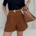 Women casual solid color loose straight shorts detail view showing high waist and belt design. - S / Coffee
