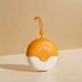 Rouleau anti-peluches mini portable avec dragonne, epilateur rond pour vetements. - Orange