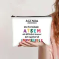 Detail view of canvas makeup bag with French teacher appreciation text design - French Style (Agenda ATSEM)