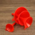 Red plastic funnel set, 4 pieces heavy duty kitchen utility tool for oil liquid transfer. - Four-Piece Set / Red