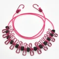 Portable travel elastic clothesline with windproof clips and hooks for outdoor drying. - Rose Red with Positioning