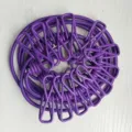 Purple portable elastic travel clothesline with integrated clips for outdoor and home drying. - OPP Packaging / Purple