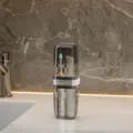 Set da viaggio per spazzolino portatile con spazzolino elettrico e tazza di stoccaggio grigia. - Grigio trasparente