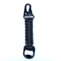 Outdoor black paracord keychain with carabiner clip and integrated bottle opener. - Black