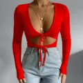Red cutout long sleeve ribbed top detail view, sexy V-neck slim fit apparel design style. - L / Tops / Red