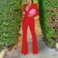 Detailed view of women's red velvet blazer and flared pants set, elegant autumn fashion outfit. - S / Top And Bottom / Red