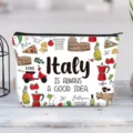 Detail view of canvas makeup bag with vibrant Italy-themed illustrations - Italy Theme Style