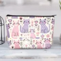 Detailed close-up of a canvas cosmetic pouch with cute pink and purple cat cartoon patterns - Cartoon Cat Floral Style