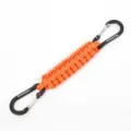 Close-up of vibrant orange paracord keychain with black carabiners for outdoor gear. - Orange