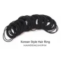 Close-up of 0.2cm seamless thin black elastic hair ties for kids and adults - Black