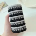 Close-up of 15 durable woven high-elastic hair ties in black and grey textures - 15 Pieces/Pack / Bottled Golden Black and White