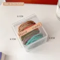 Elastic hair bands set in a clear square storage box with dimensions marker - 50 Pcs Bag / Multicolor