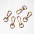 Mosquetones giratorios de aleación de zinc dorados, mini accesorios de llavero para bolsos. - Oro Chapado