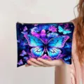 Close-up of a vibrant dreamlike butterfly print canvas cosmetic bag held in hand - Dreamy Butterfly and Purple Flower Print (jiayingpbb0673)