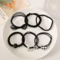 Six-piece set of durable black elastic hair ties with pearls and checkered bow accents - 6# Black Hair Tie 6-Piece Set