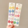 Close-up view of various colorful star-shaped hair clips on white display cards - Small Star (1#) / 20 Pieces/Pack / Macaron Color Assortment