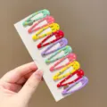 Detailed shot of colorful polka dot BB hair clips for girls on display card - Teardrop Style (1#) / 10 Pieces/Pack / Rainbow Polka Dot